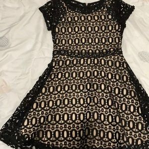 A set of a dress, jeans, and a shirt